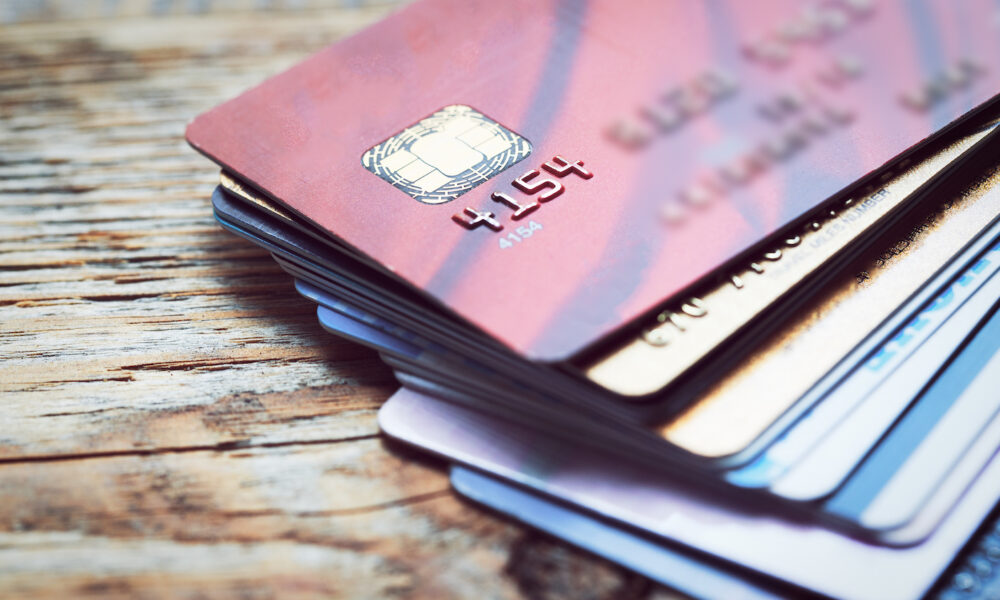 Credit cards fanned out on table