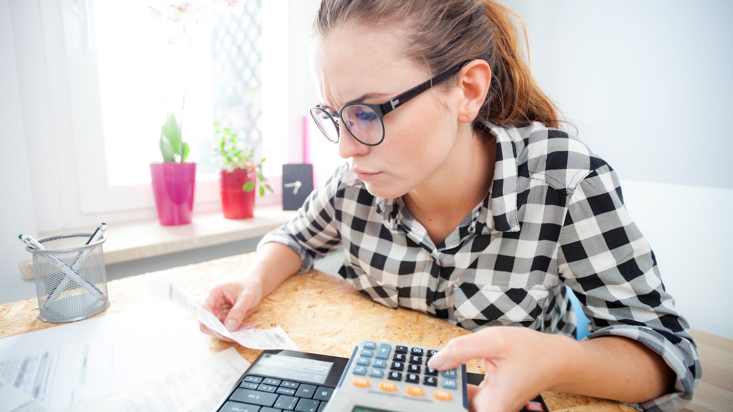 Woman paying bills