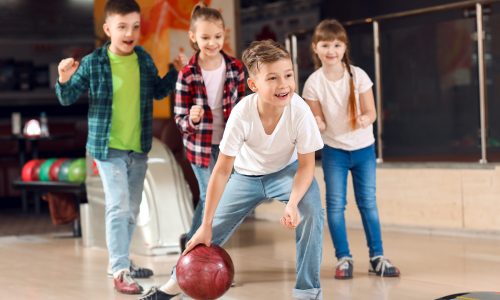 Children bowling