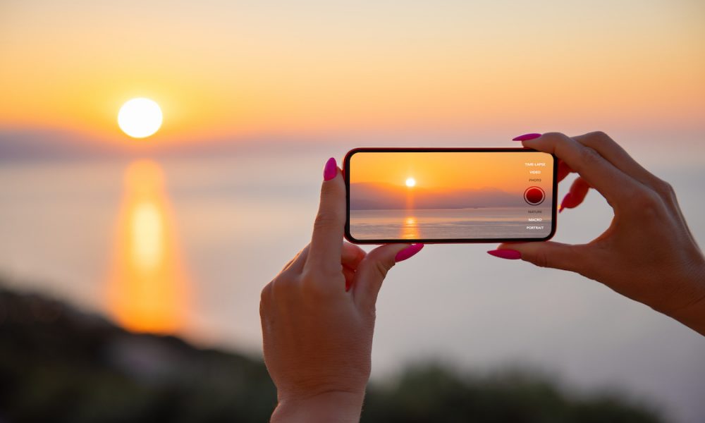 Woman holding mobile phone