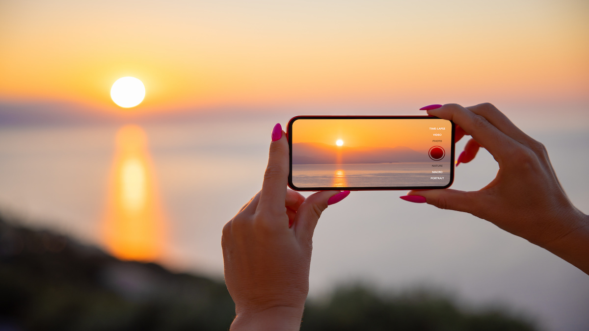 Woman holding mobile phone