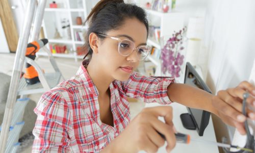 Woman works on DIY home project