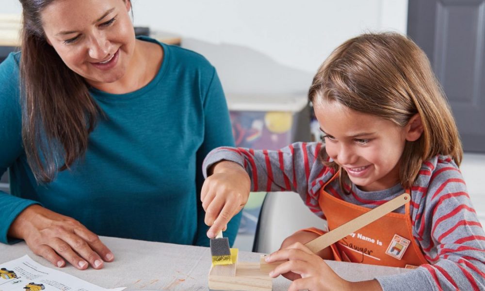 Home Depot's free kids workshops lets parents and children work together on projects.