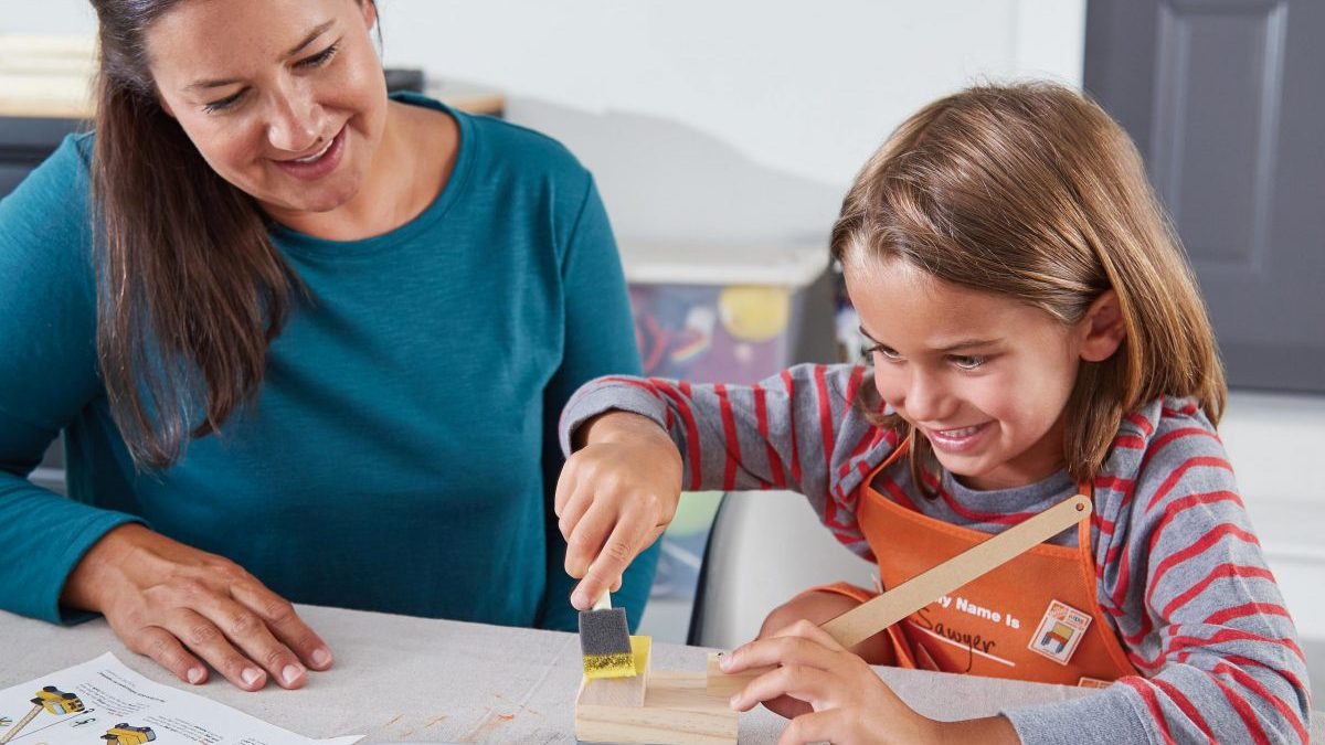 Home Depot's free kids workshops lets parents and children work together on projects.