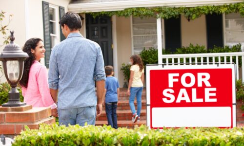 Family walks up to home for sale