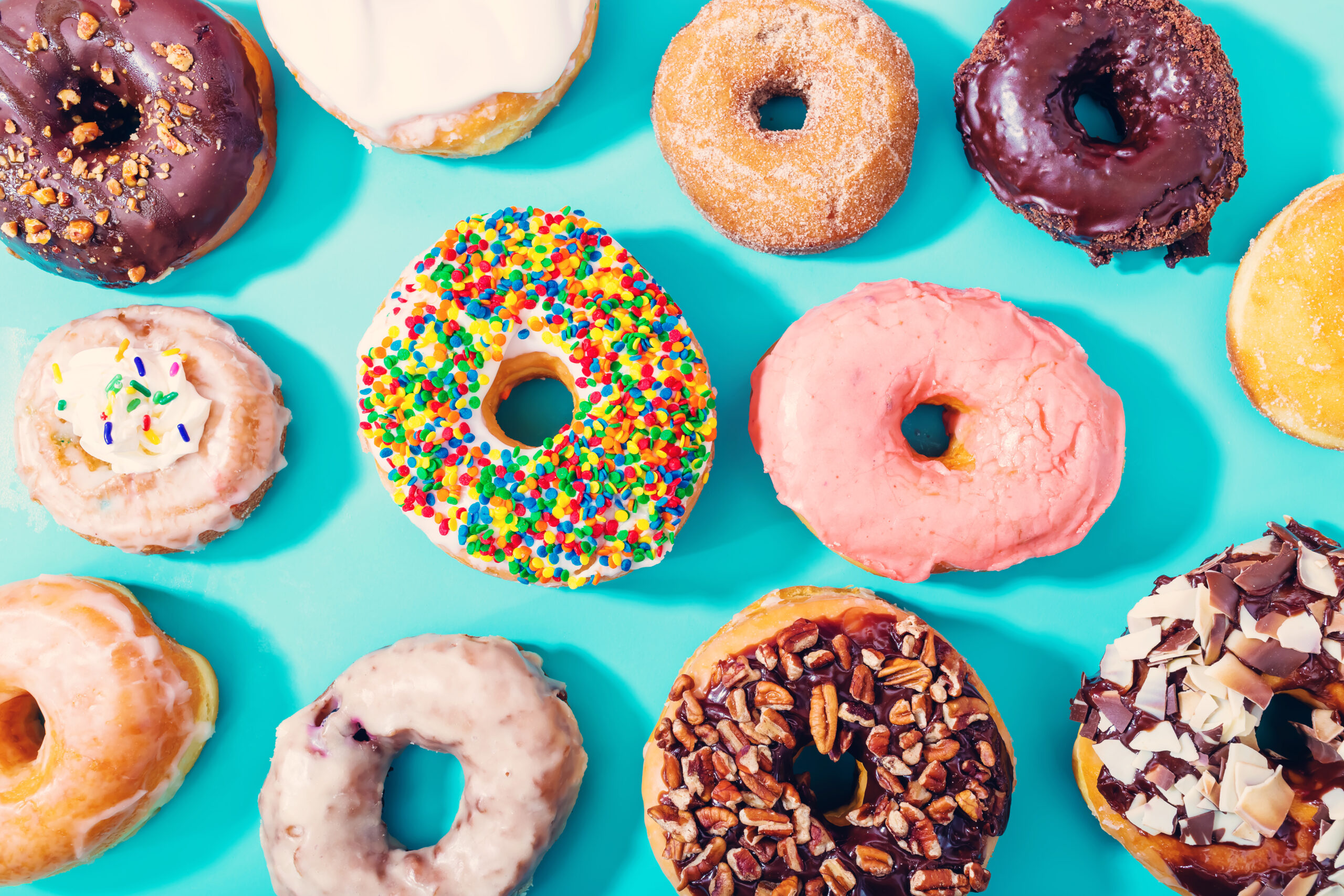 Assorted donuts on blue background