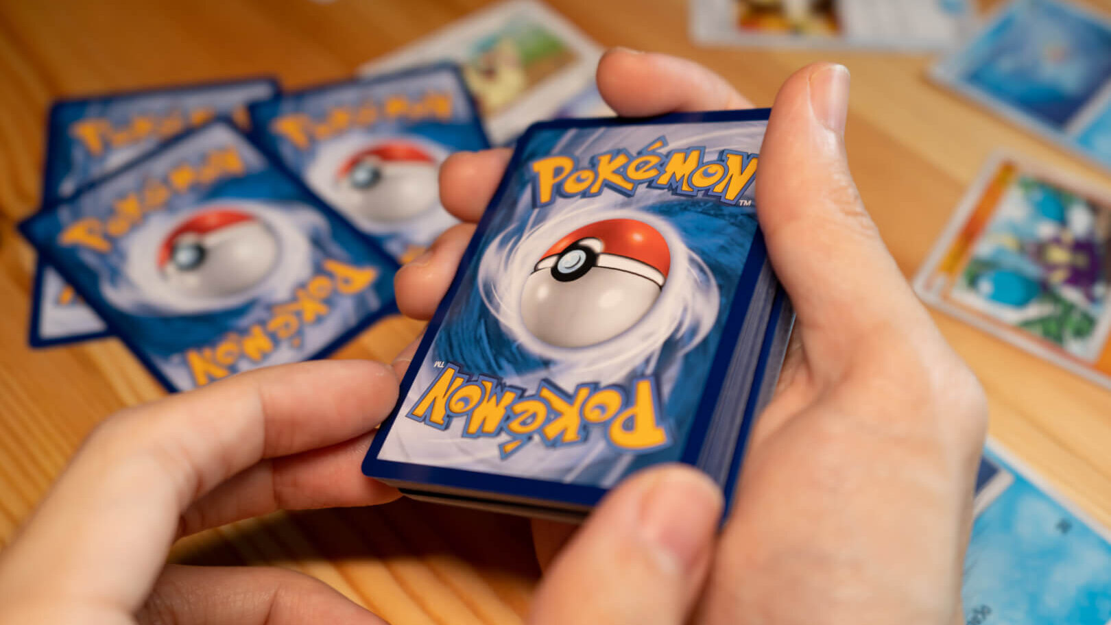 A man playing Pokemon Trading Card game