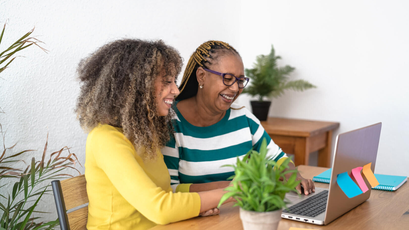 Mom and daughter on computer