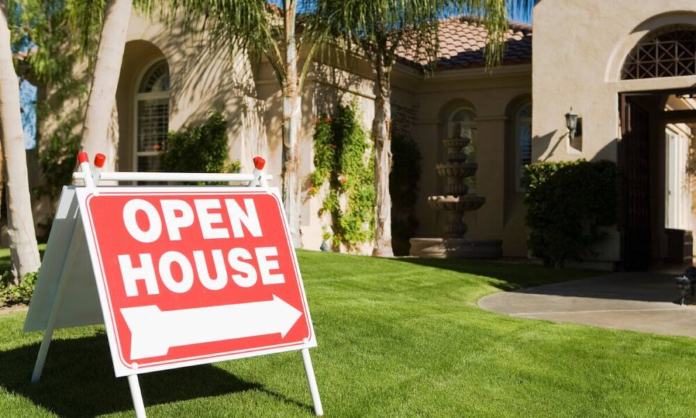 Open house sign in front of home for sale