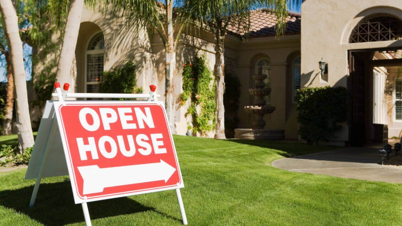 Open house sign in front of home for sale